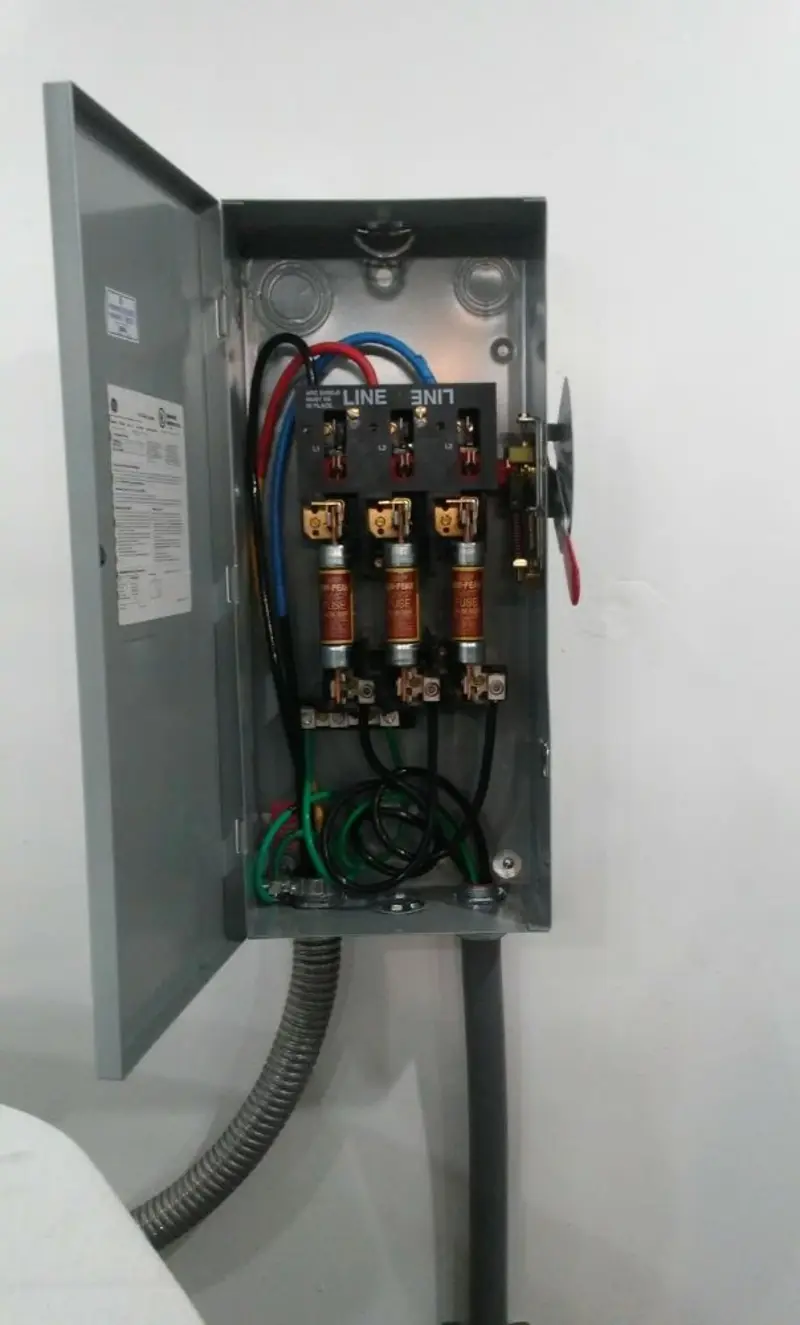 Three-phase disconnect switch installed for Smoke Detector Installation in Saks
